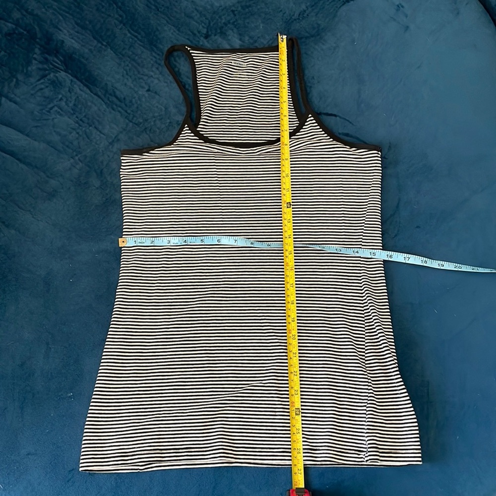 Large tank top. Worn once or twice. No dogs no smoking. Open to all offers!